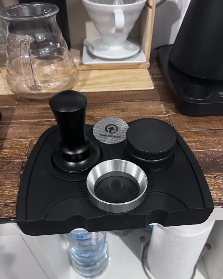 Calibrated coffee tamper photographed at home by a verified buyer — Straight 51mm