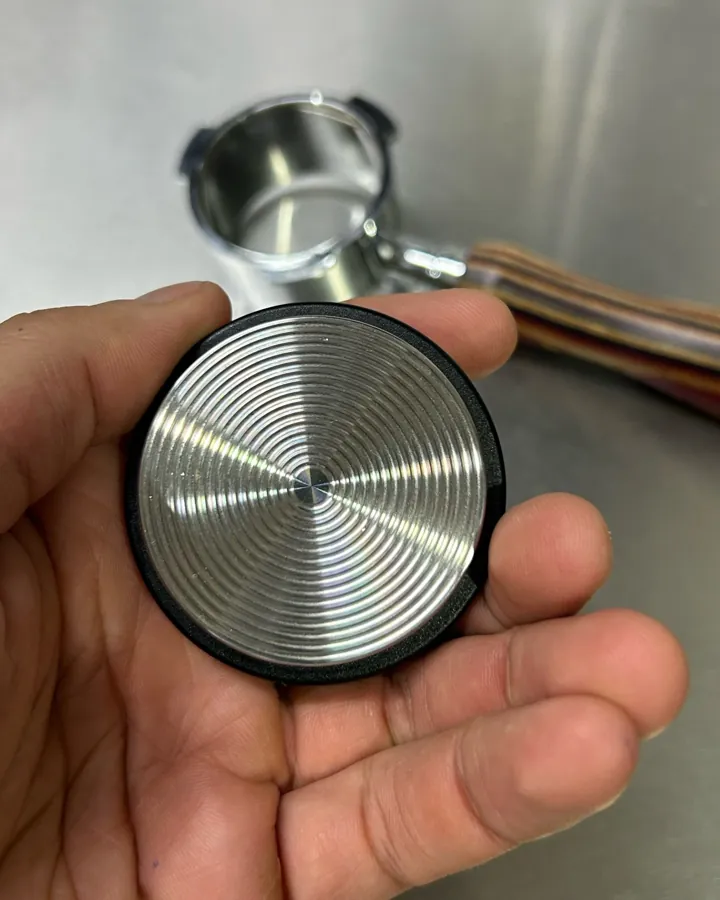 Calibrated coffee tamper photographed at home by a verified buyer — Straight 51mm