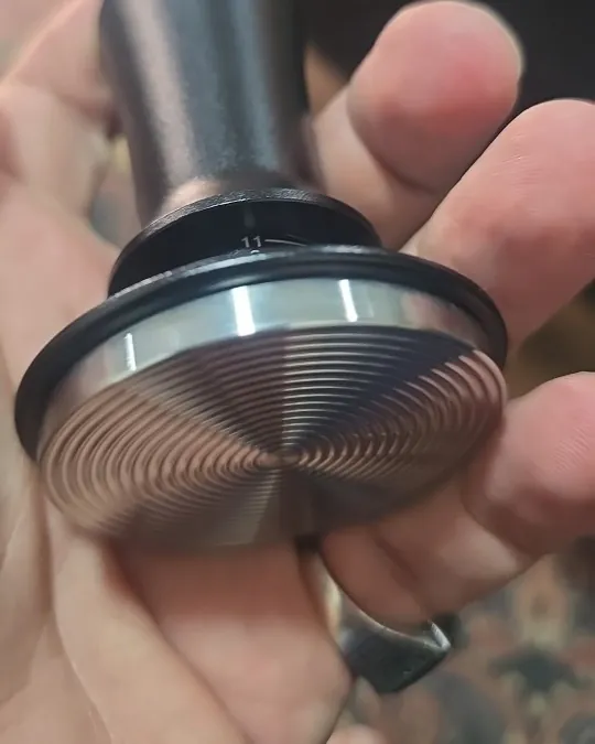 Calibrated coffee tamper photographed at home by a verified buyer — Straight 53mm 54mm